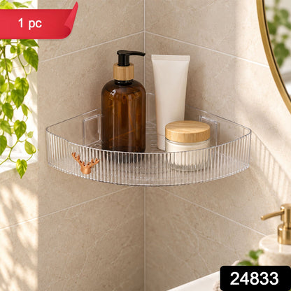 Wukusy Apex transparent corner rack with adhesive mounts for bathroom storage, mounted in a modern bathroom corner.