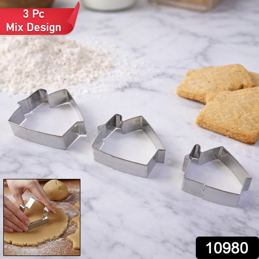 Wukusy stainless steel house-shaped cookie cutter set with three different house designs on a white background.
