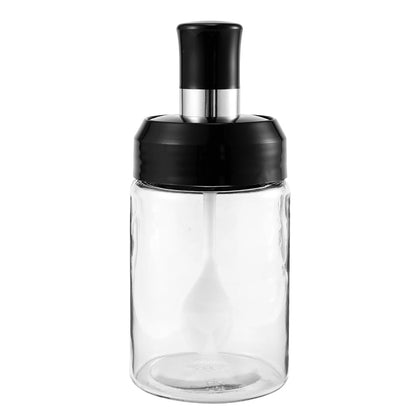 Transparent glass storage jar with built-in spoon, approximately 250ml capacity, by Wukusy for home and kitchen use.