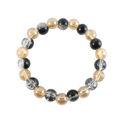 Elegant dual-tone crystal beaded stretch bracelet by Wukusy featuring sparkling beads on a flexible band.