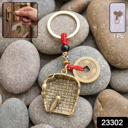 Copper plated dustpan pendant keychain with Feng Shui lucky coin bag charm, featuring intricate design and Wukusy branding.
