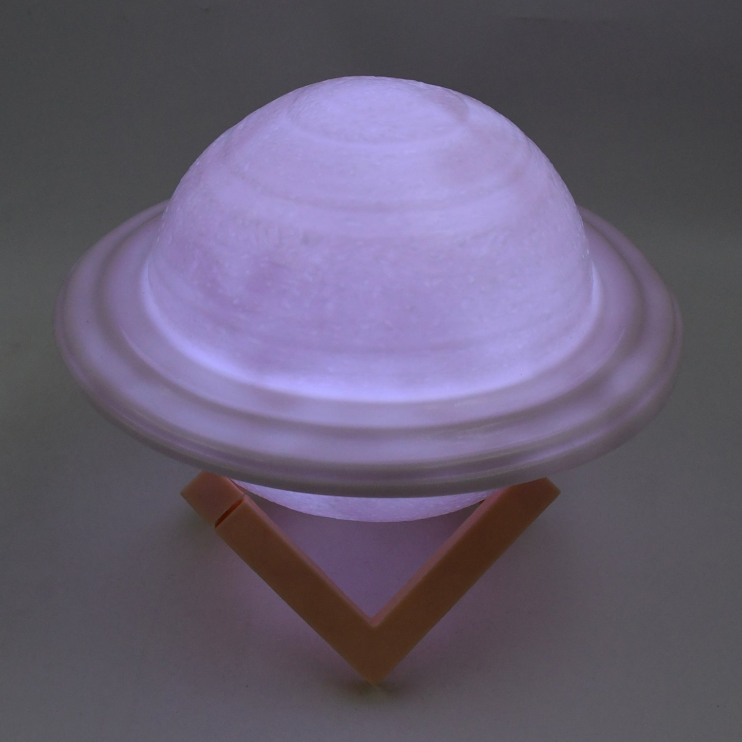 Wukusy 3D Saturn lamp home decor night light with multicolor LED, featuring a base for bedside or room decoration.
