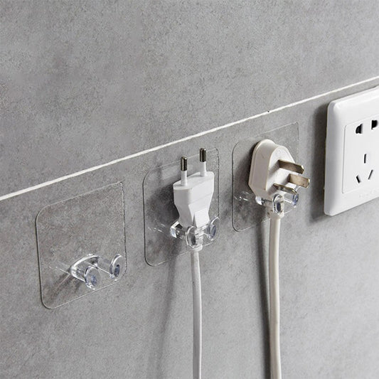 Wukusy 4861 transparent multi-function wall storage hooks mounted on a wall for home organization and storage.