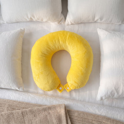Wukusy soft U-shaped travel neck pillow with head support cushion, ideal for flights, shown in a neutral color on a plain background.