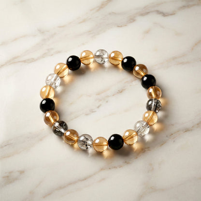 Elegant dual-tone crystal beaded stretch bracelet by Wukusy featuring sparkling beads and a comfortable elastic fit.
