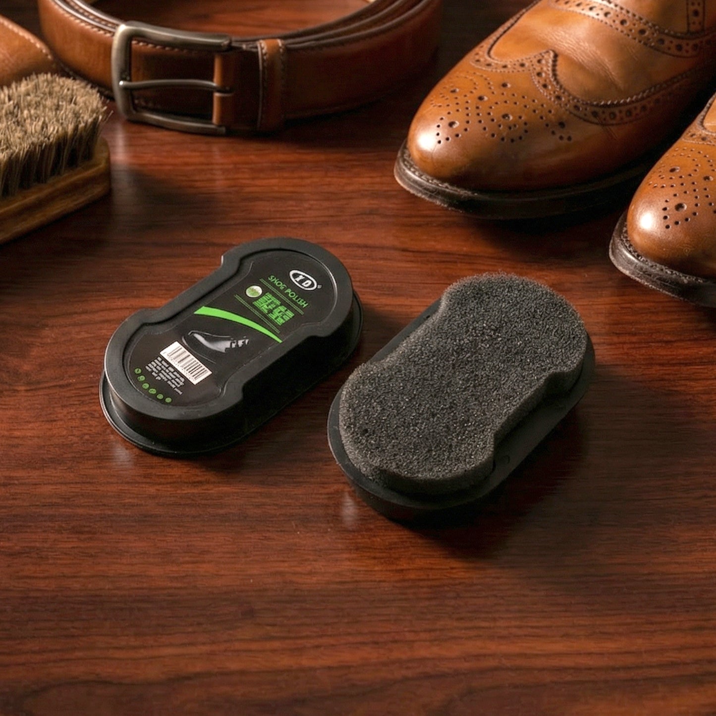 Wukusy instant shoe polish sponge applicator for leather shoes, showing the compact sponge ready for polishing use