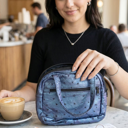 Metallic blue mini zipper handbag with ostrich pattern for women, featuring a compact design and Wukusy branding.