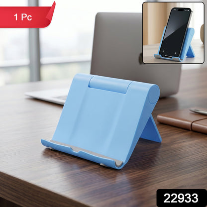 Wukusy plastic foldable mobile phone stand on a desk, perfect for video calls and hands-free use.