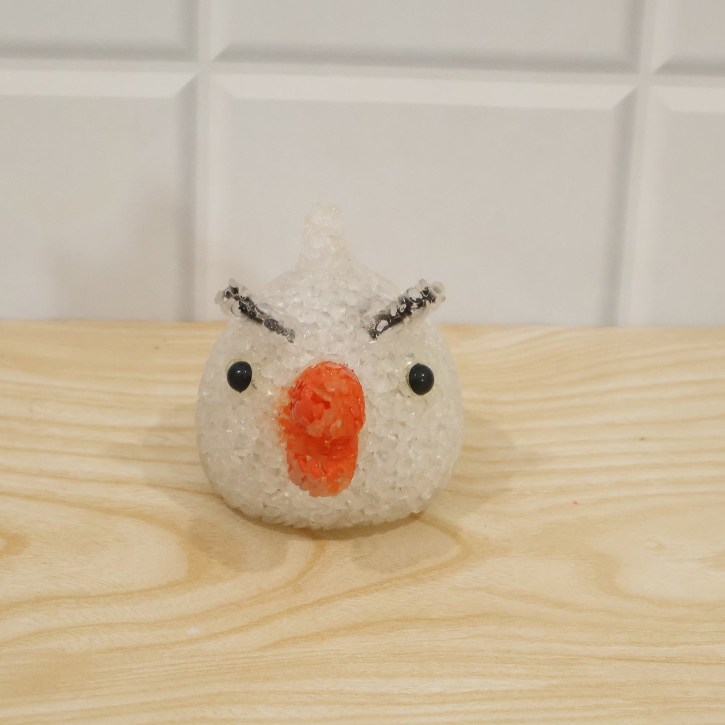 Wukusy cartoon chick shape LED night lamp with crystal texture emitting warm glow, perfect for children's bedroom decor.
