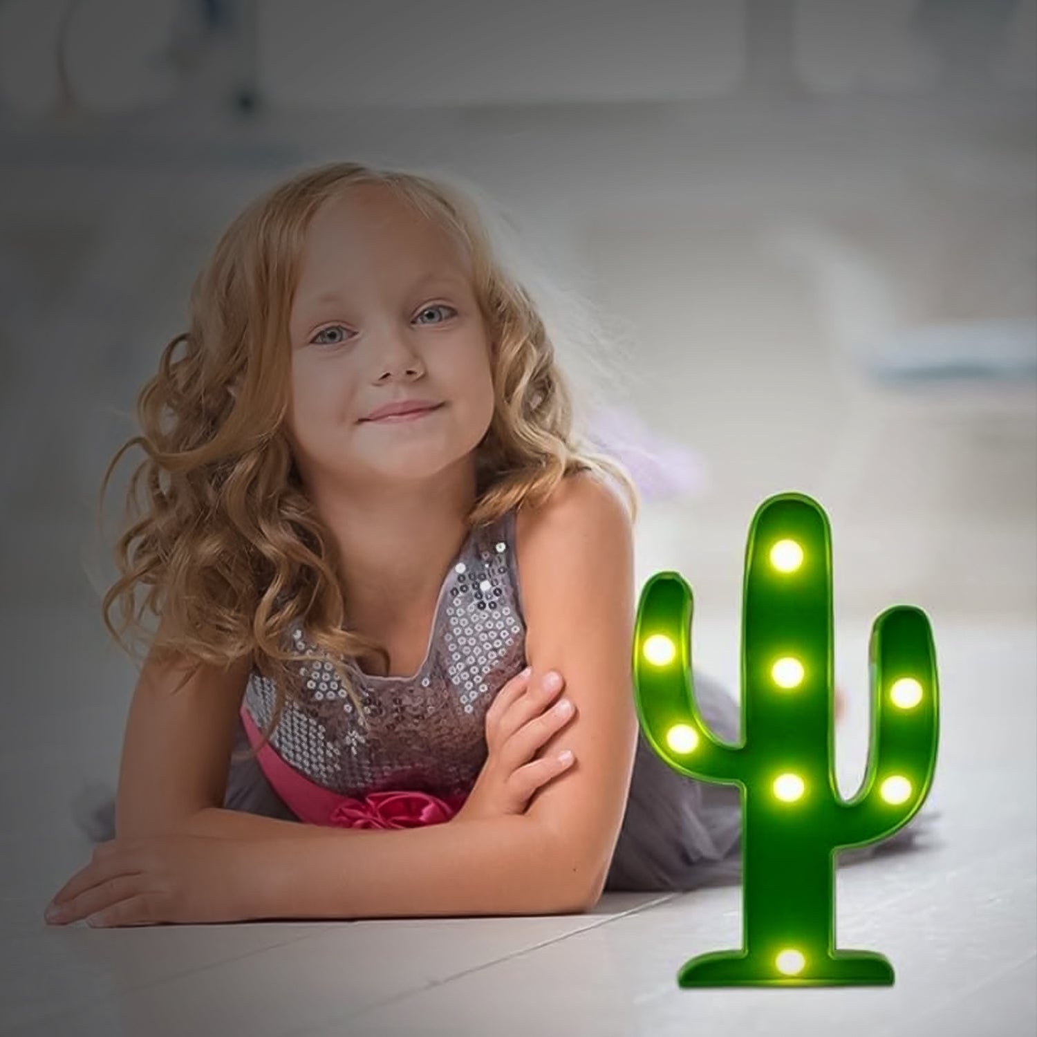Wukusy LED cactus desk lamp with battery compartment for office use, featuring a vibrant cactus-shaped light on a desk surface