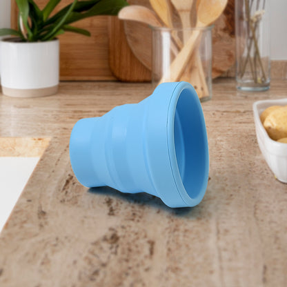 Wukusy round silicone foldable travel mug without lid, portable glass mug for travel and outdoor use in home and kitchen settings