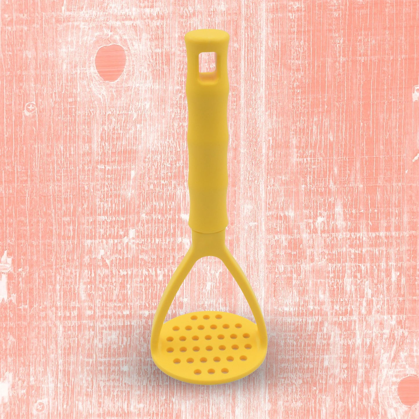 Wukusy 5493 kitchen food masher with comfortable grip, heavy-duty potato masher tool for vegetables and fruits in a home kitchen.