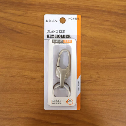 Wukusy stylish metal key holder with secure lock clip, featuring a sleek design and keychain attachment for organizing keys.