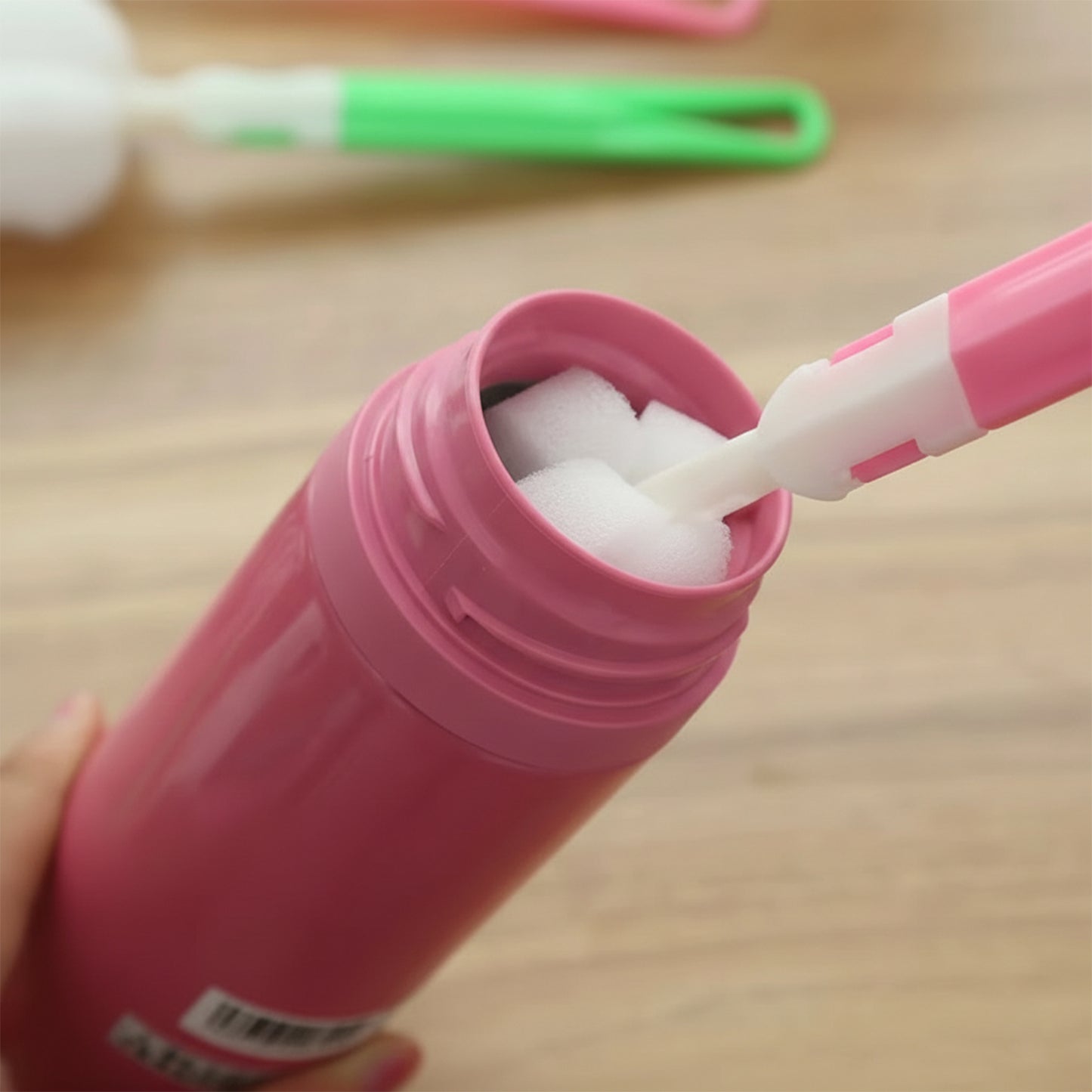 Long handle silicone bottle cleaning brush by Wukusy, 32 cm, with flexible bristles for thorough cleaning of bottles and jars.