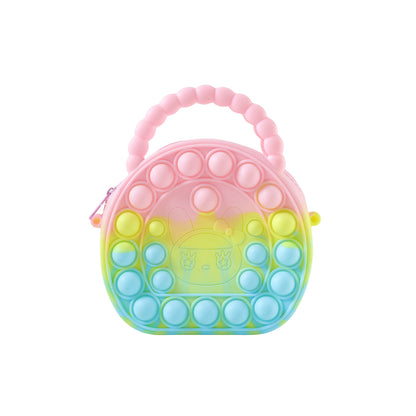 Rainbow round silicone Pop It coin purse by Wukusy with colorful, textured silicone surface and compact coin storage.