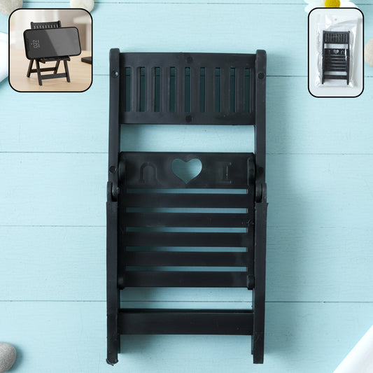 Black mini chair-shaped mobile stand holder by Wukusy, showing its compact design and sturdy base for smartphone support.