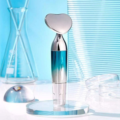 Wukusy face vibratory massager facial beauty device with ergonomic handle and silicone massage head for skincare.