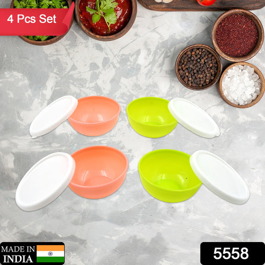 Set of four Wukusy 5558 small round plastic bowls with lids, microwave and dishwasher safe, lightweight and reusable chutney bowls.