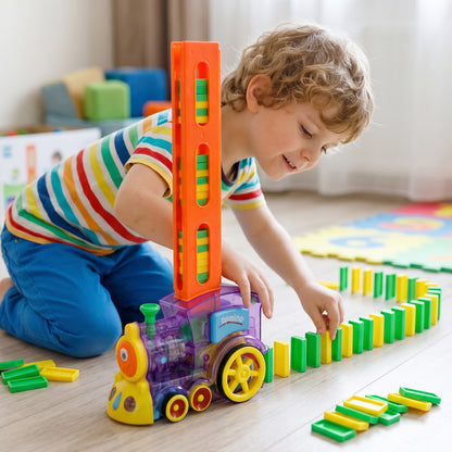 Wukusy automatic domino laying train engine toy for kids with built-in light and music, showing colorful train with moving parts.