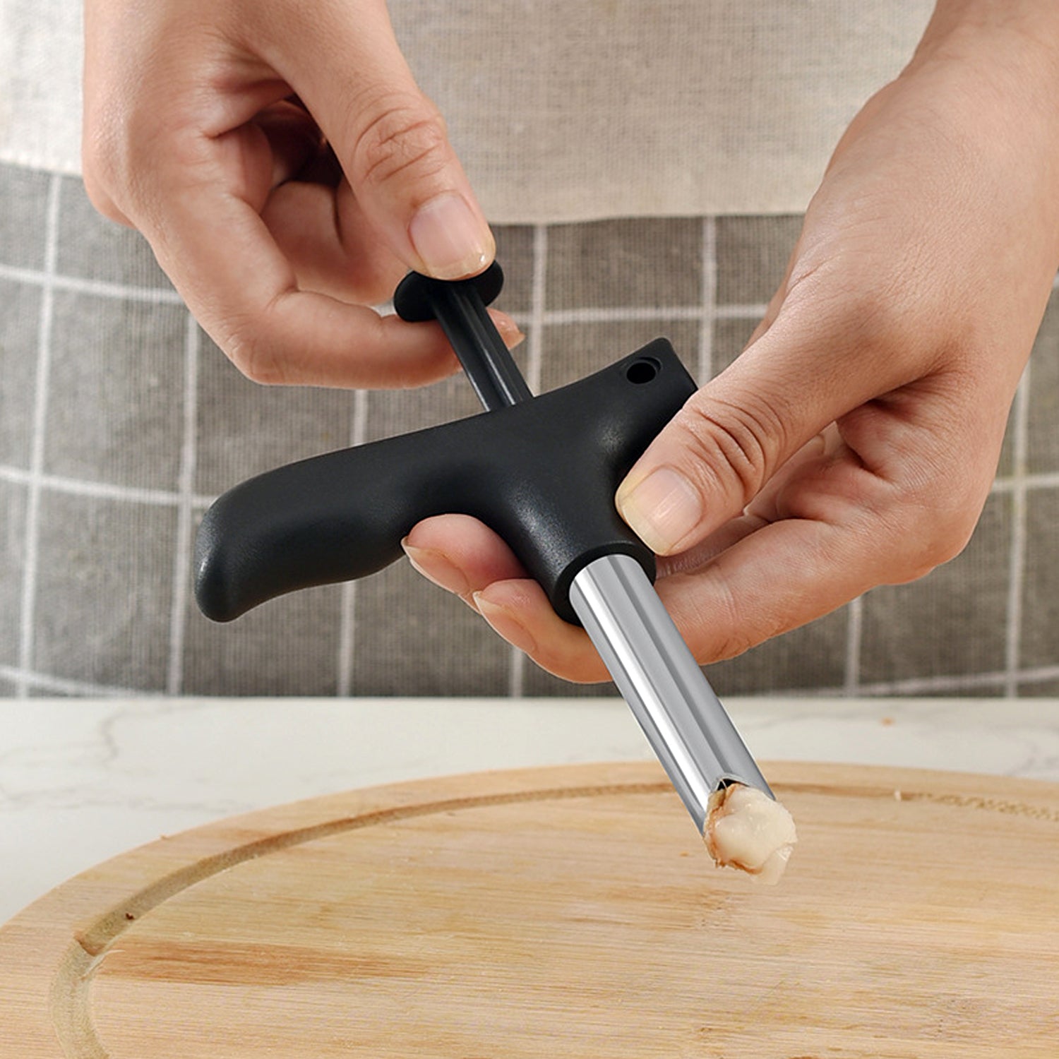 Wukusy Supermom coconut opener tool with ergonomic handle, designed for easy opening of coconuts in a single piece