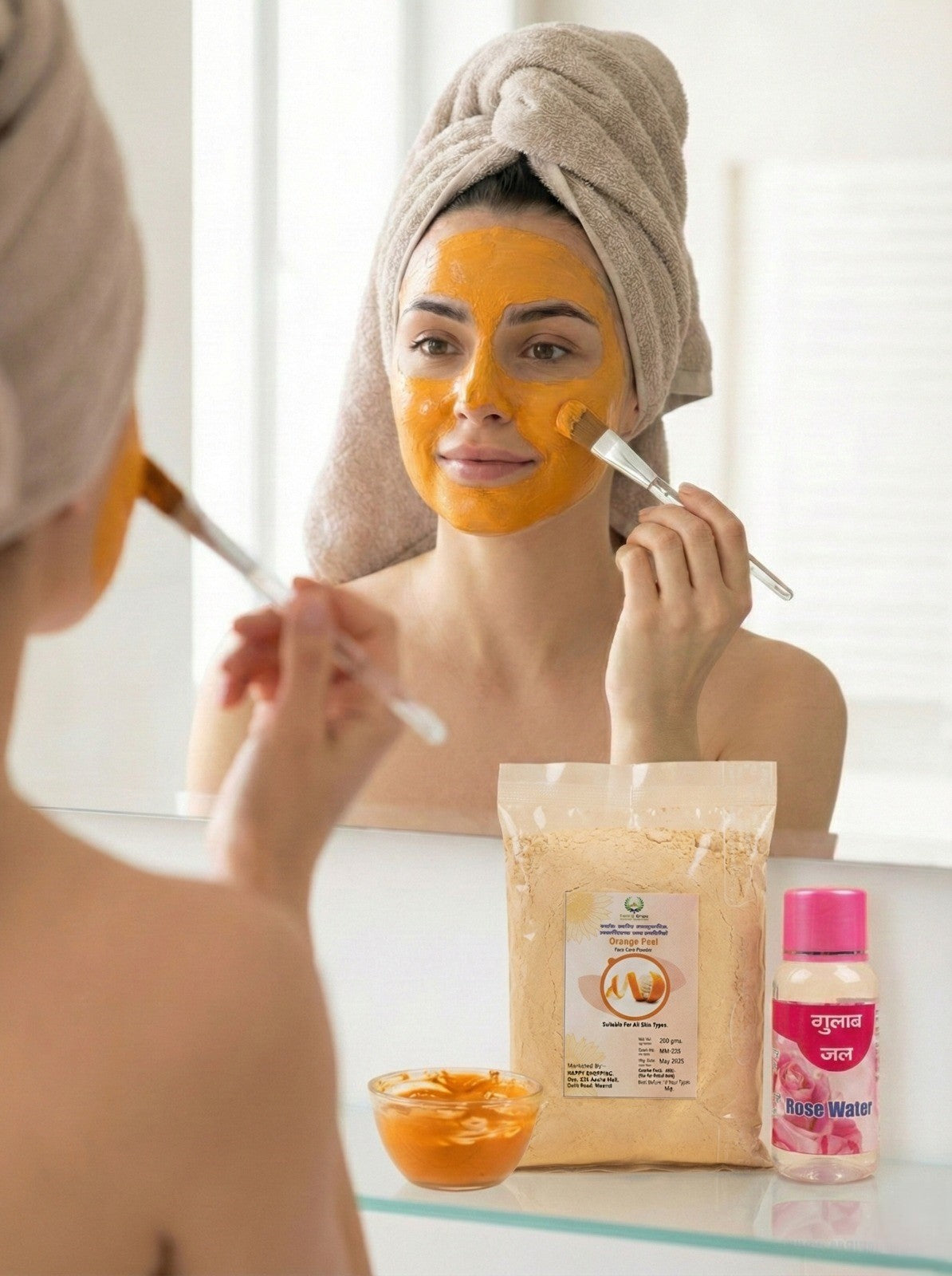Dropdash Orange Peel Face Pack with Rose Water and brush, showing the jar and applicator for skincare and wellness.