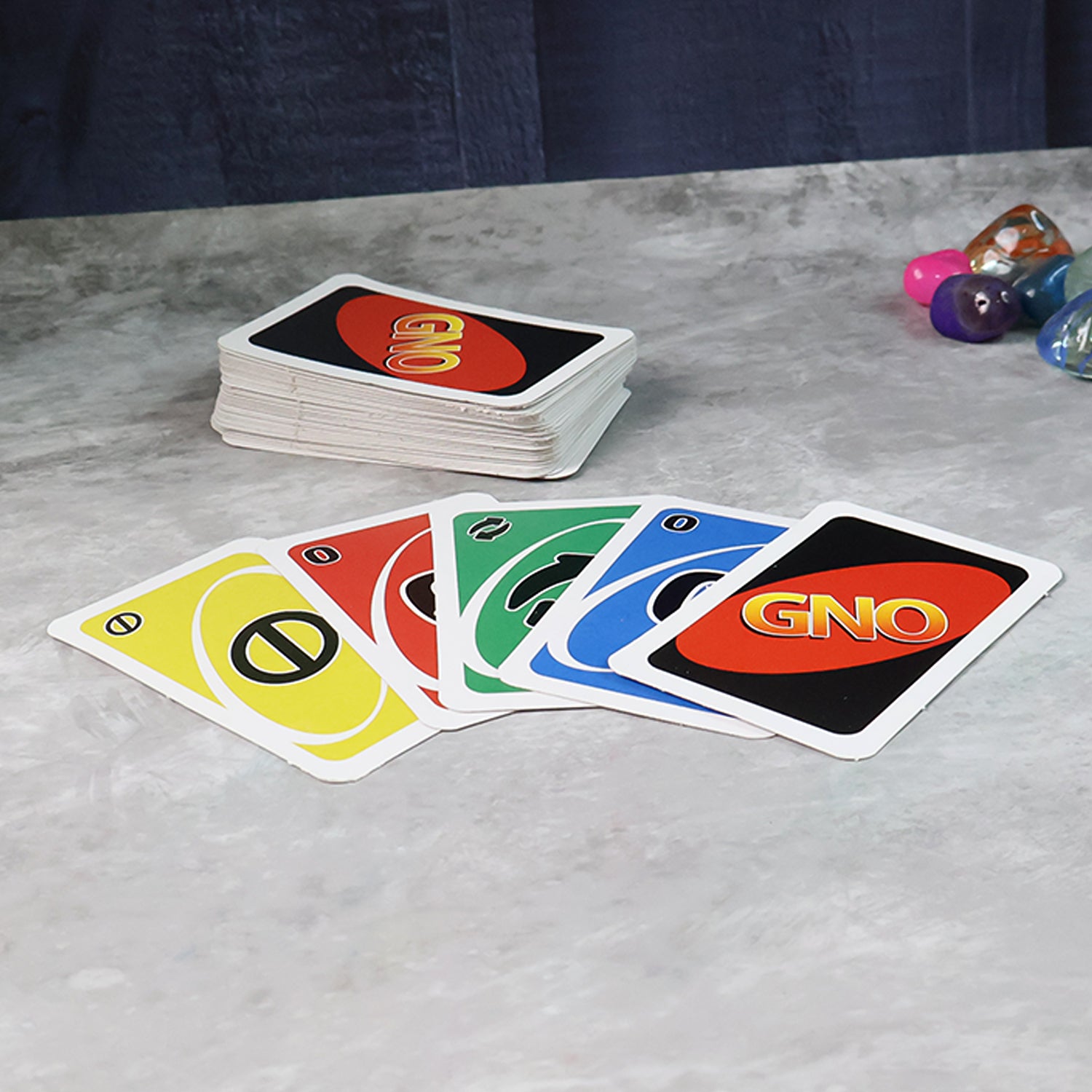 Wukusy Gno Pixar Anniversary Card Game with 112 colorful toy cards for family fun and entertainment.