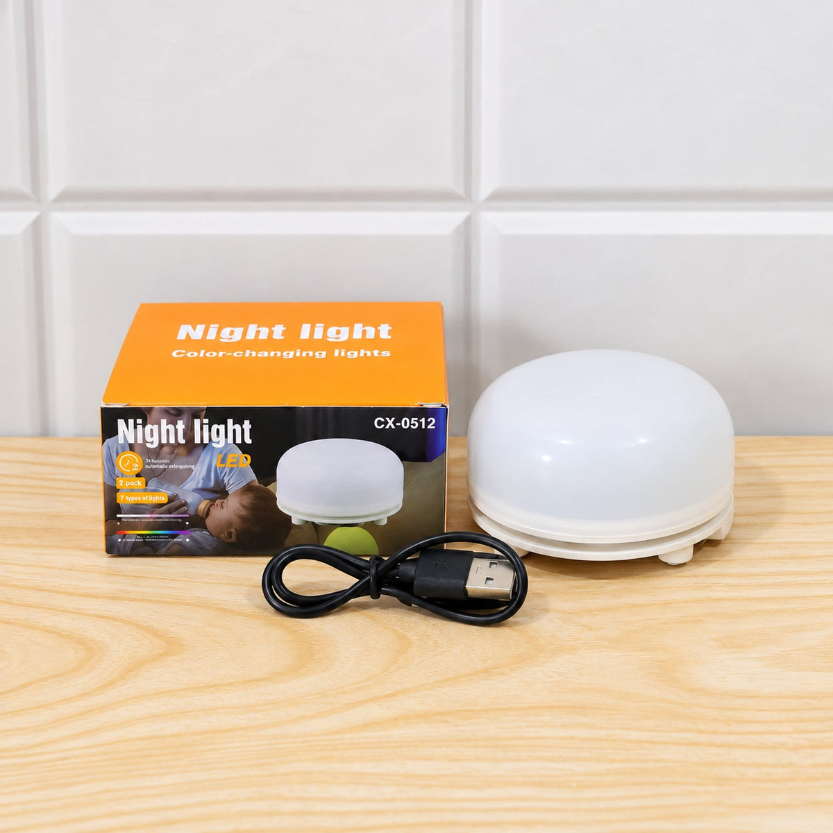 Wukusy portable LED night light with USB charging, hanging handle, and 7 color options, ideal for bedside or travel use.