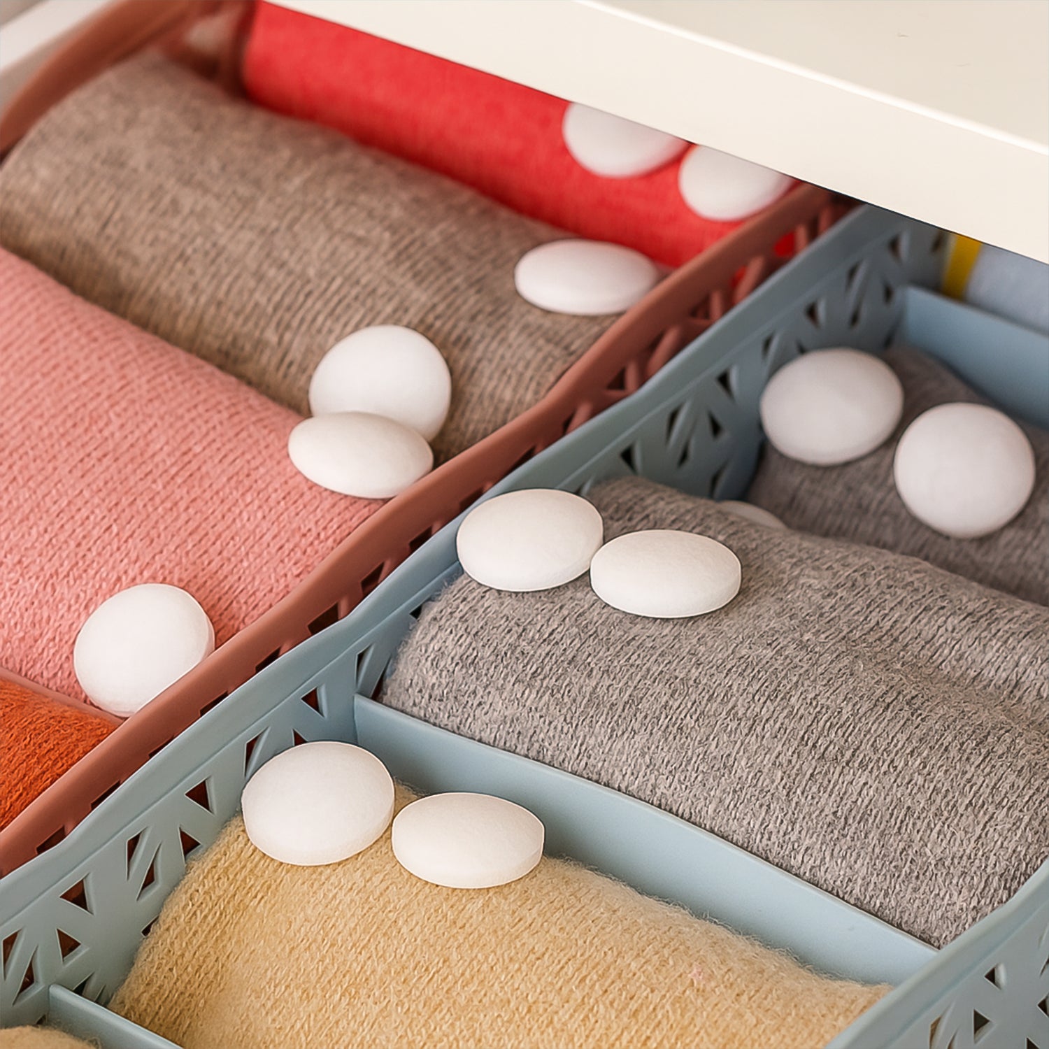 Wukusy premium naphthalene mothballs in a packet, used as cupboard deodorizer tablets for home storage protection.