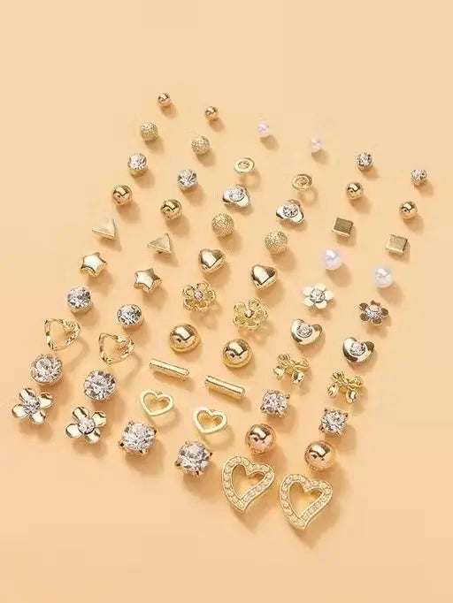 Gold plated multicolor pearl and AD stud earrings from Ekom, featuring 30 pairs of jewelry and watches accessories.