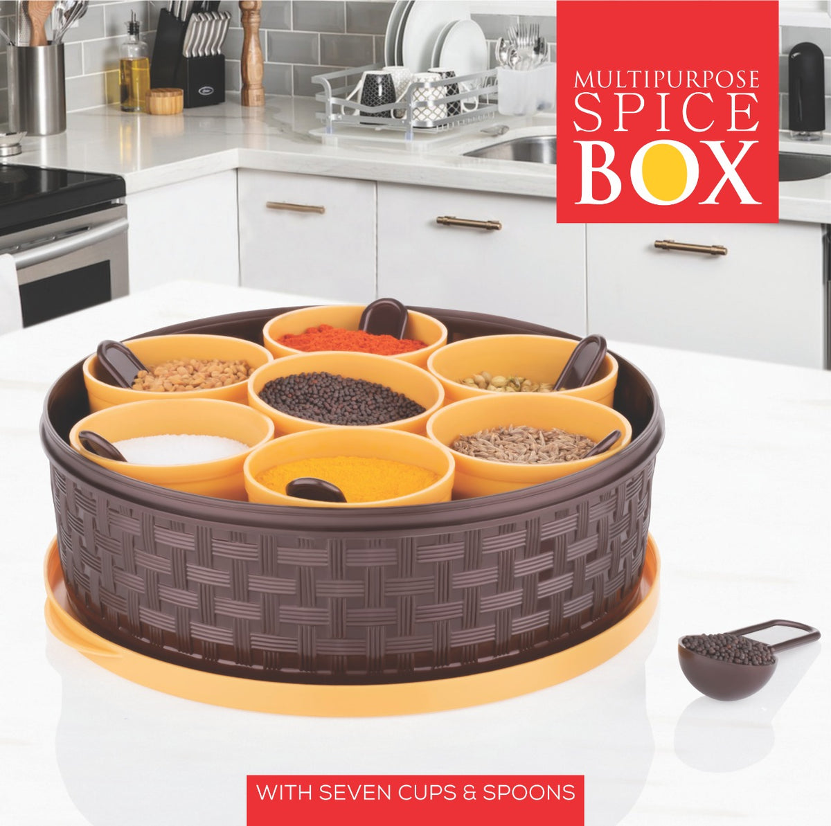 Dropdash plastic masala box with 7 compartments and spoons, used for storing spices in a religious or spiritual kitchen setting.