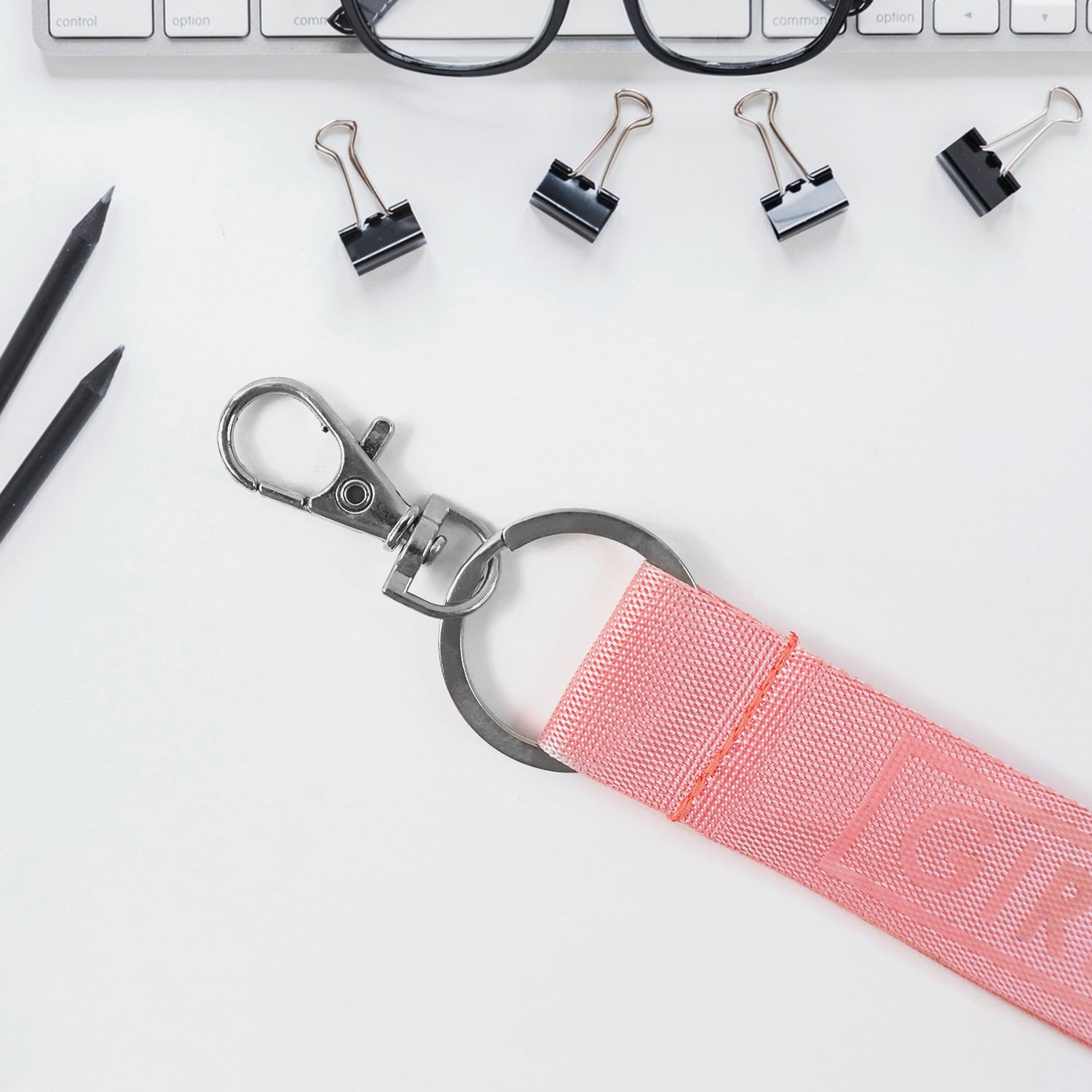 Wukusy fabric ribbon keychain in mixed colors, ideal for office accessories, featuring a soft, colorful fabric strap with metal keyring