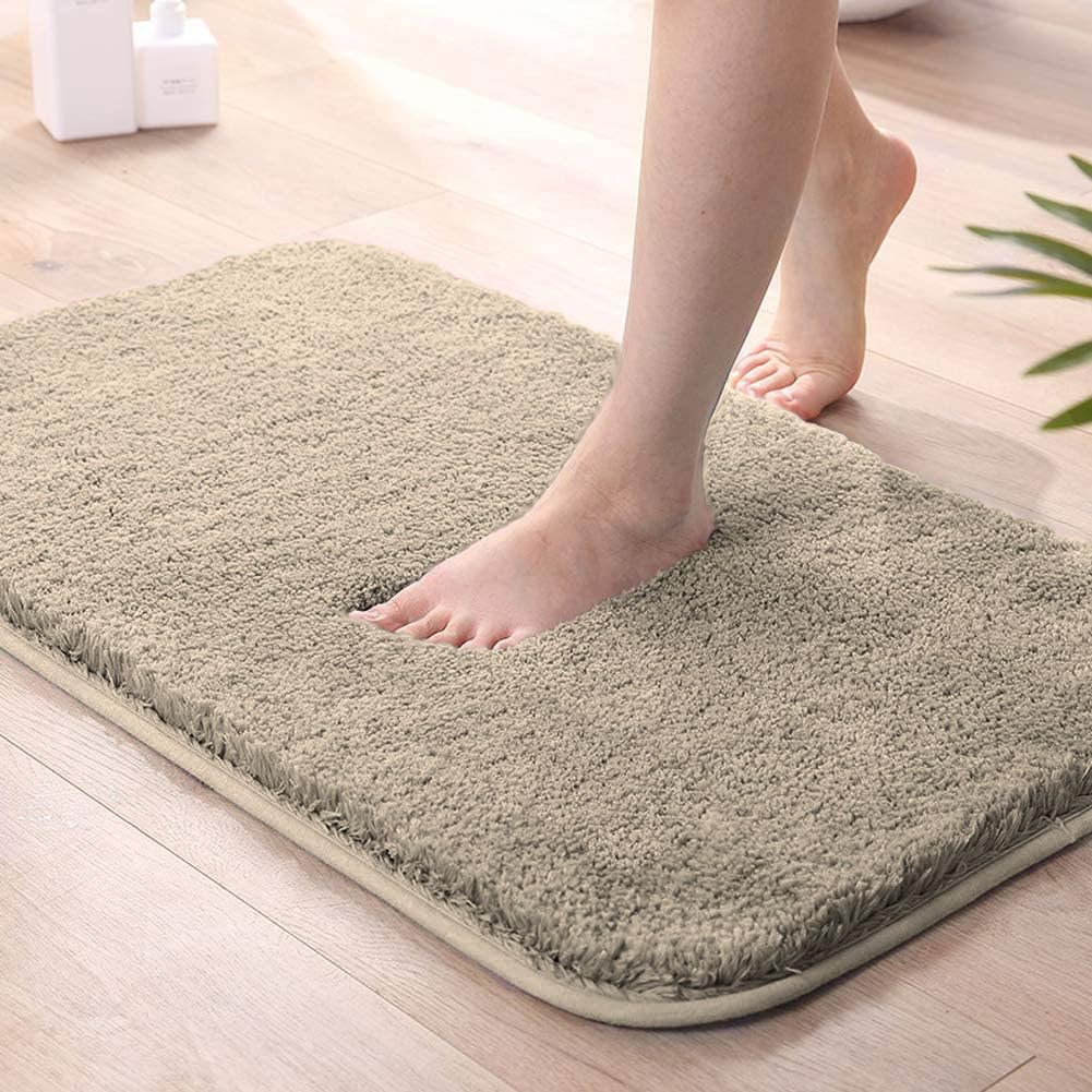 Seasons microfiber beige bath mat for bathroom, soft and absorbent, shown on bathroom floor. Pack of 1.