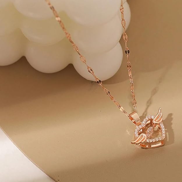 Rose gold stainless steel chain pendant with flying feather and heart design, featuring cubic zirconia for women and girls.
