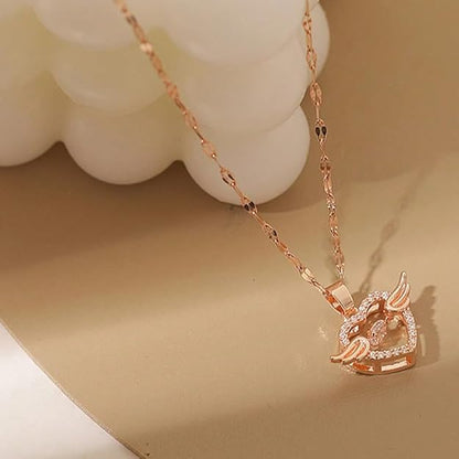 Rose gold stainless steel chain pendant with flying feather and heart design, featuring cubic zirconia for women and girls.