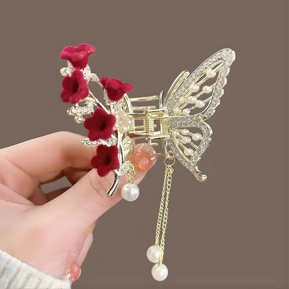 Luxury butterfly hair claw clip with rhinestones, velvet flowers, and pearl tassels, elegant decorative hair accessory for women and brides.