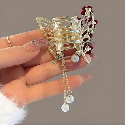 Luxury butterfly hair claw clip with rhinestones, velvet flowers, and pearl tassels, a decorative hair accessory for women and brides.