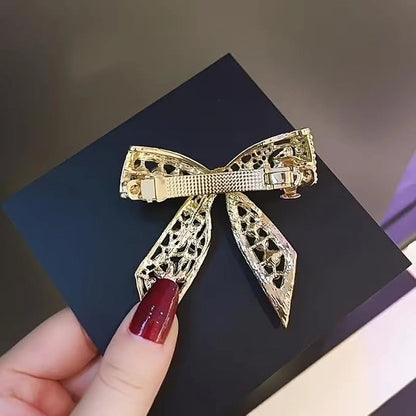 Gold plated pearl hair clip with bowknot design and CZ stones, French barrette for women's hair accessories, ideal for weddings and events.