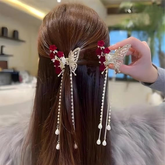Luxury butterfly hair claw clip with rhinestones, velvet flowers, and dangling pearl tassels, elegant decorative hair accessory for women.