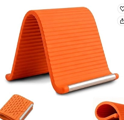 Foldable silicone phone stand from 35561, showing a compact, flexible mobile holder with a sleek, foldable design in black.