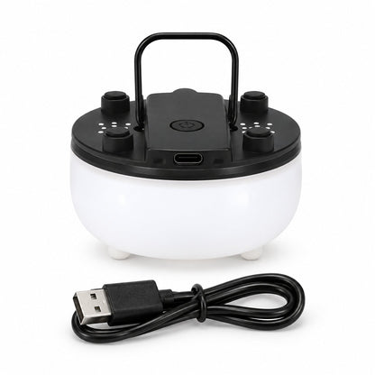 Wukusy portable LED night light with USB charging, hanging handle, and 7 color options, glowing softly in a dark room.