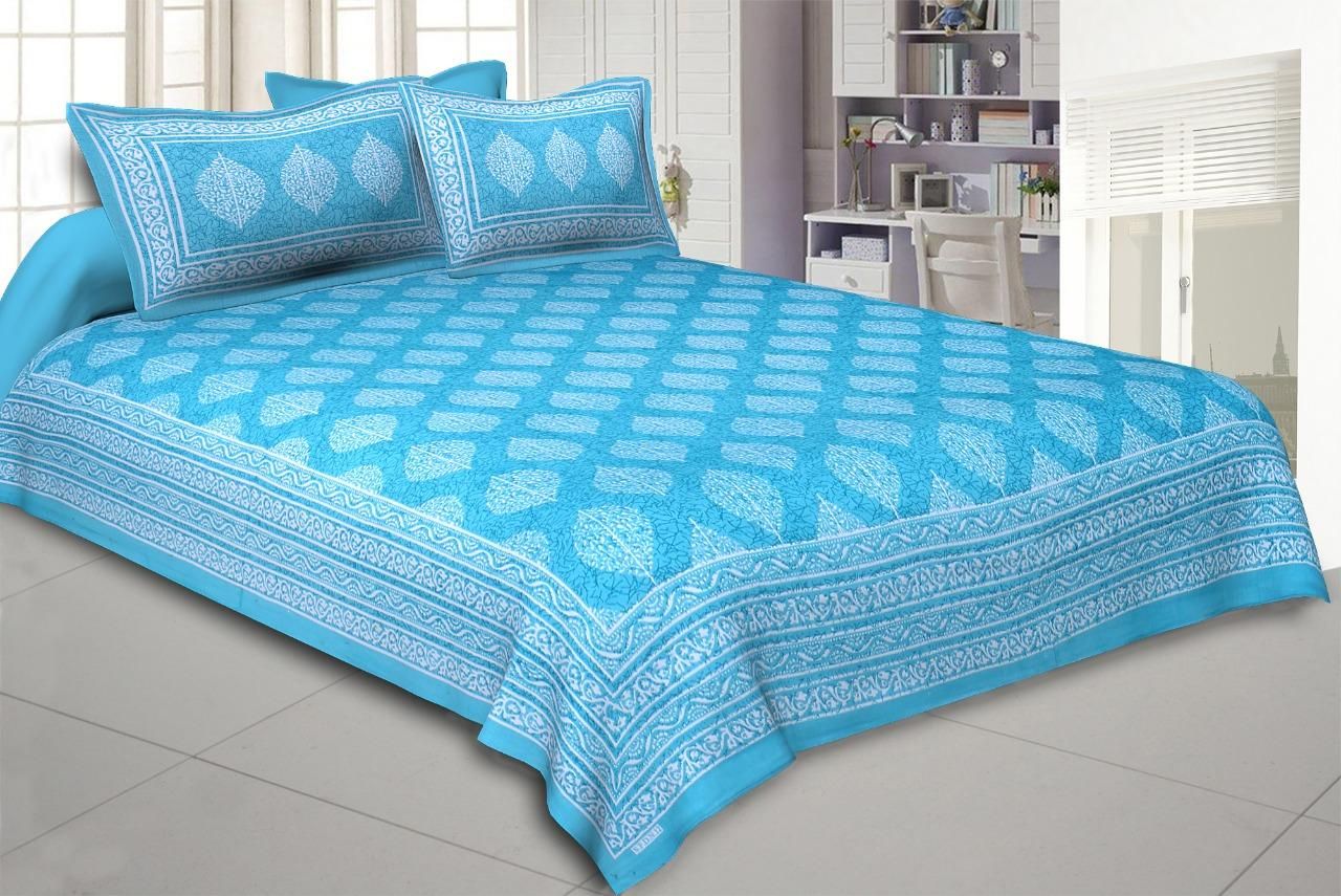 Cotton Jaipuri printed double bedsheets with colorful traditional patterns, crafted by Drpshippr for vibrant bedroom decor.