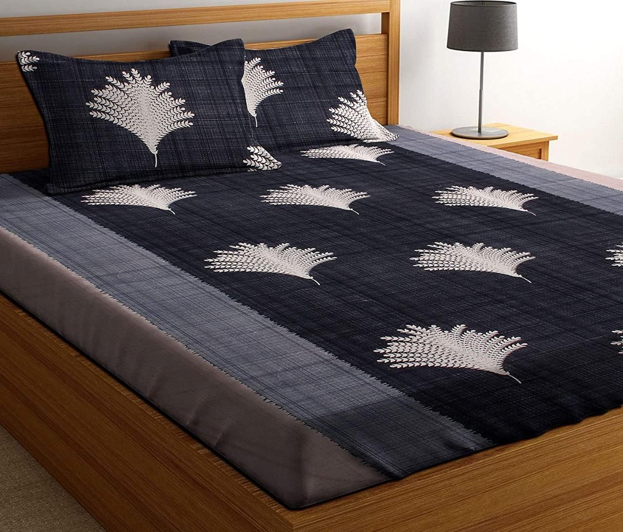 Cotton printed double bedsheets with colorful floral patterns, designed for comfortable double beds by Drpshippr.