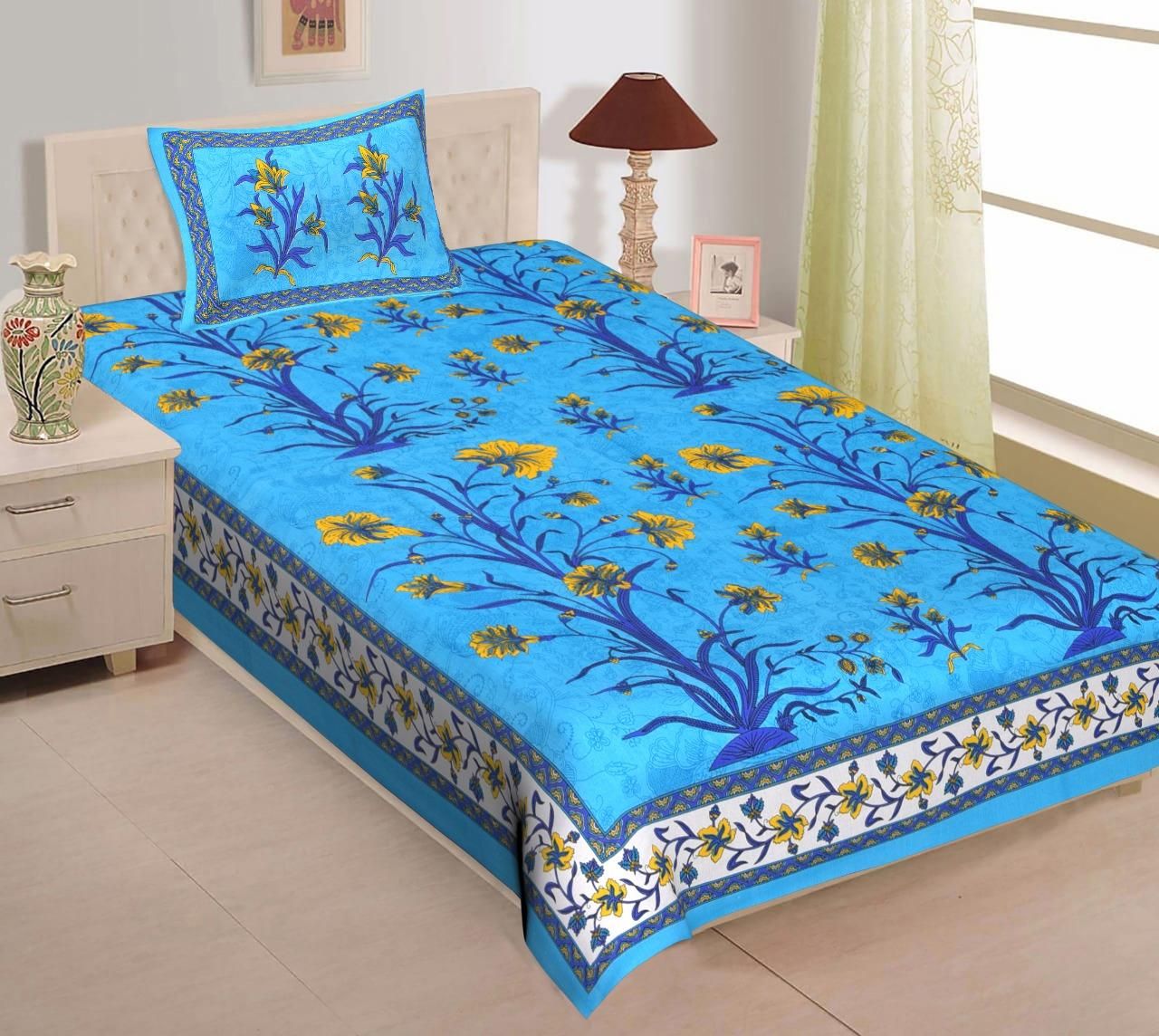 Cotton printed single bedsheet from Drpshippr with colorful floral pattern, perfect for a cozy bedroom.