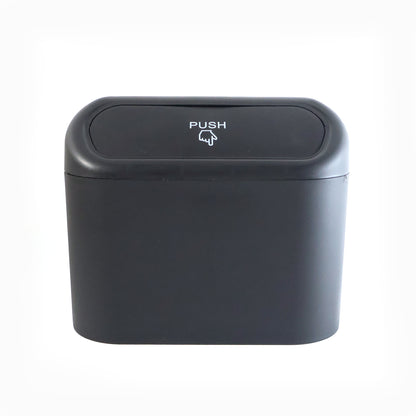 Wukusy waterproof mini car trash can with lid, compact storage bin for vehicle waste, in black with a sleek design.