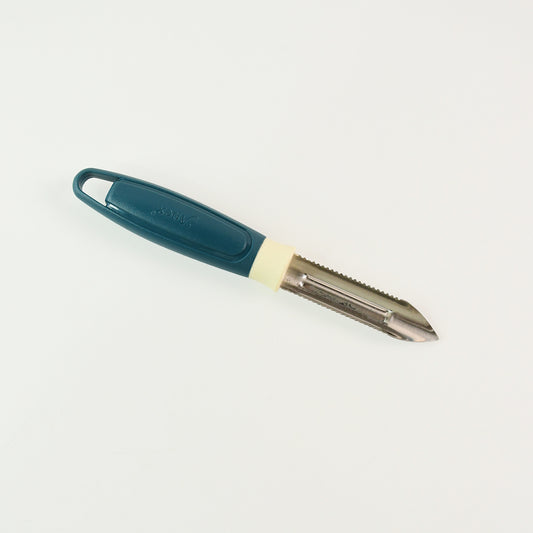 Wukusy Apex stainless steel blade potato peeler with ergonomic handle and sharp peeling blade on a white background.