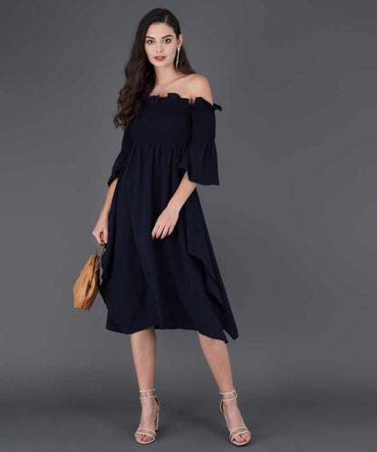 Elegant women's crepe drop waist dress from Darzi Women's Collection, featuring a solid color and stylish design.