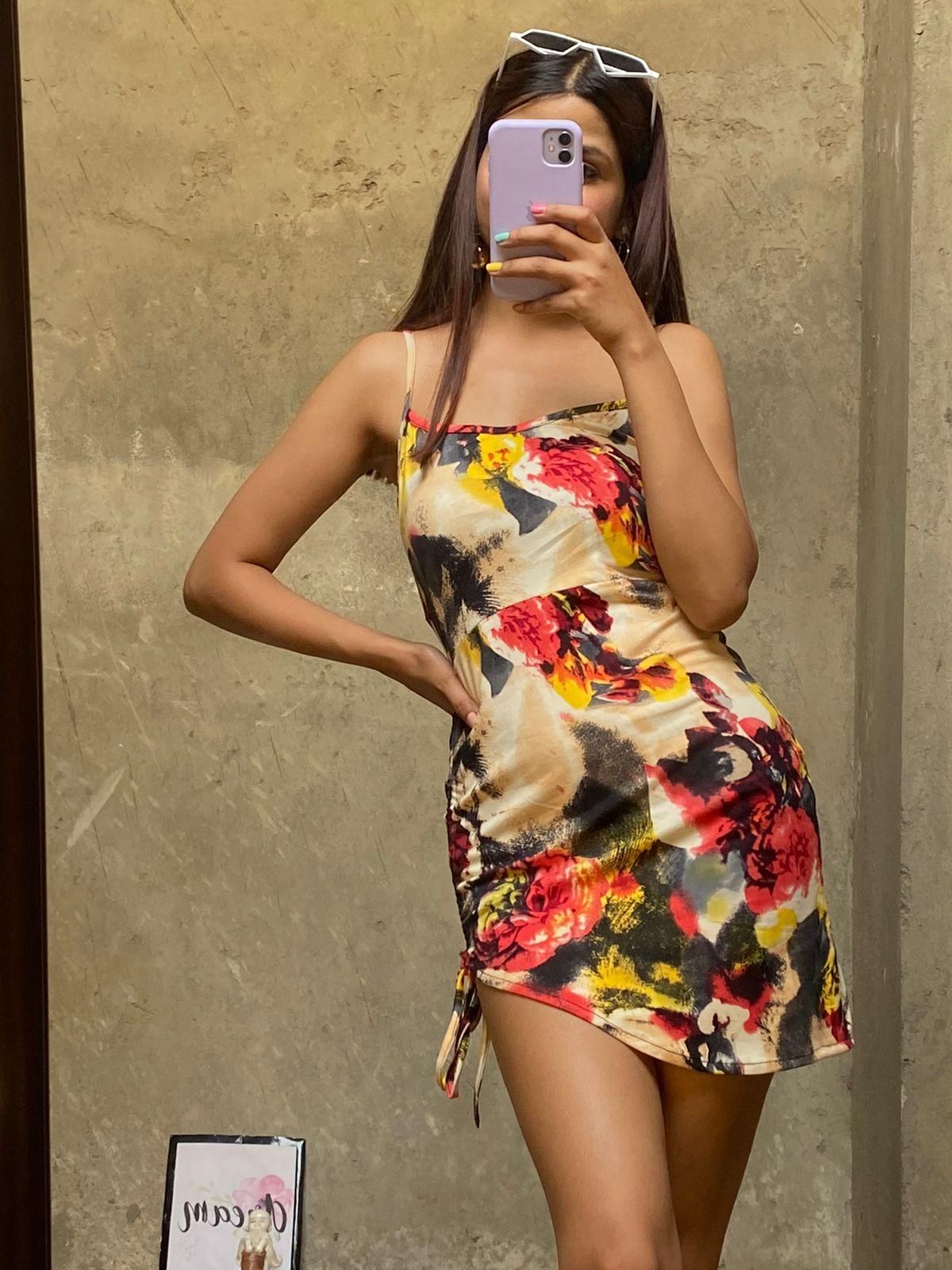Darzi women's floral bodycon dress made from lycra blend, fitted style with vibrant floral pattern, part of the Women's Collection.