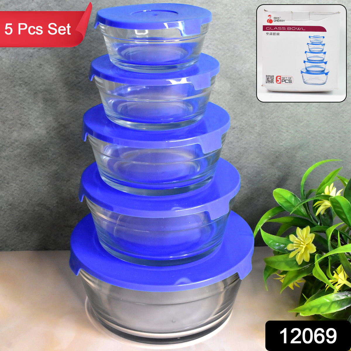 Set of five Wukusy modern glass mixing and storage bowls with lids, featuring clear glass design and secure lids for kitchen use.