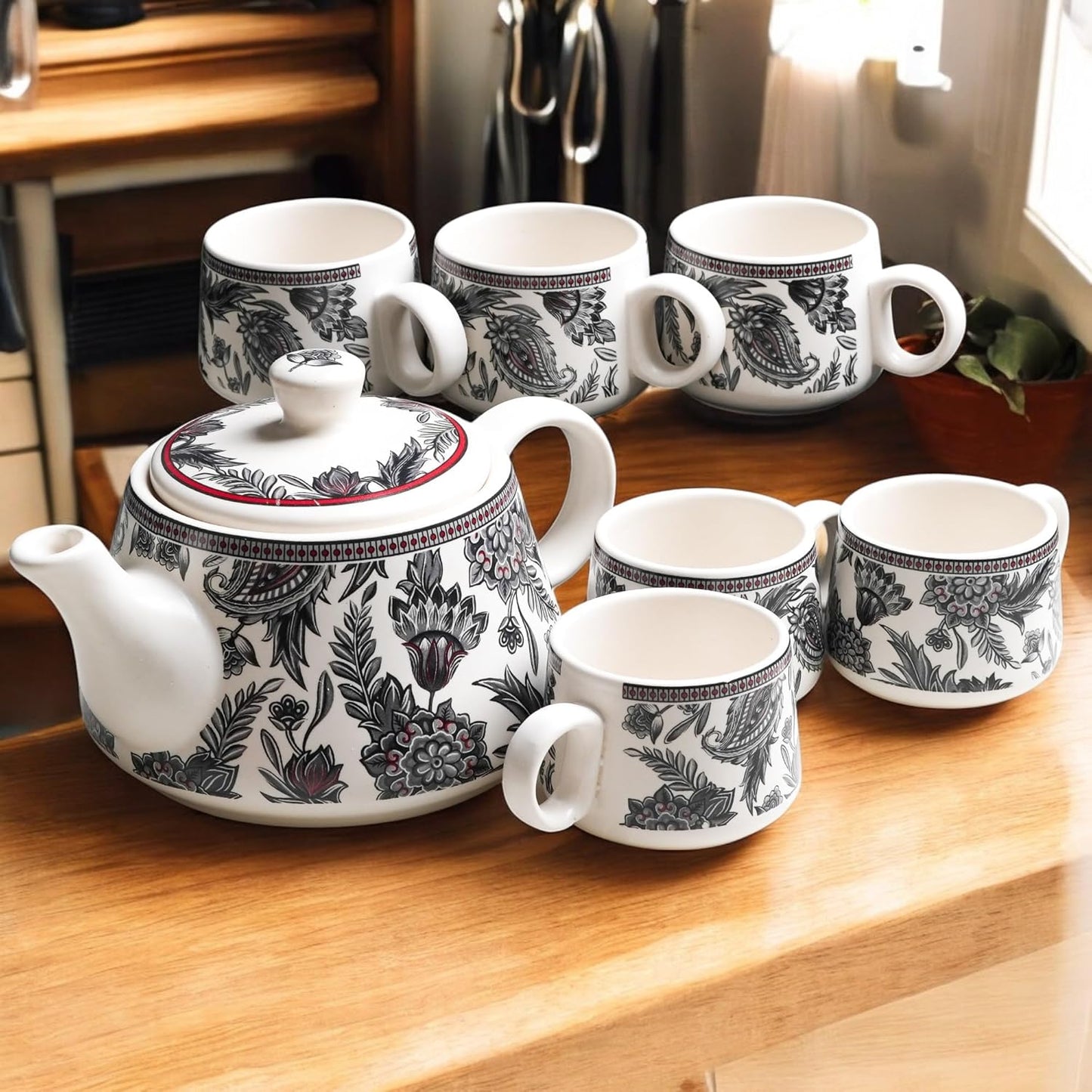 Handcrafted ceramic Stylo Black teapot and cup set for home and kitchen, featuring elegant design and durable craftsmanship.