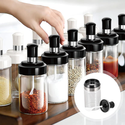 Clear glass storage jar with built-in spoon, 250ml capacity, ideal for kitchen organization by Wukusy